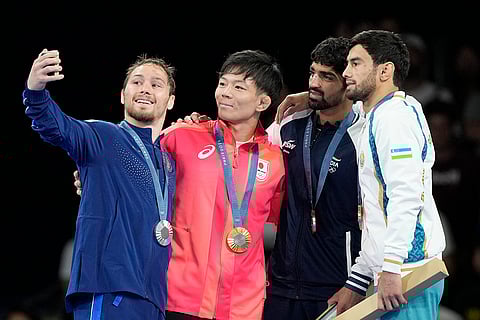 Paris Olympics men's freestyle 57kg wrestling: Spencer Richard Lee, of the United State, silver, Japan's Rei Higuchi, gold, India's Aman Aman, Uzbekistan's Gulomjon Abdullaev, bronze